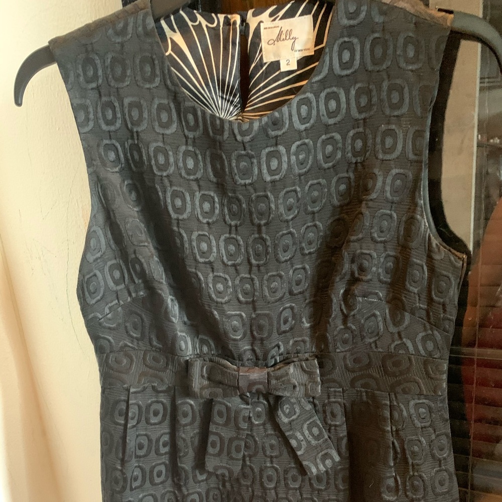 Milly peplum black top